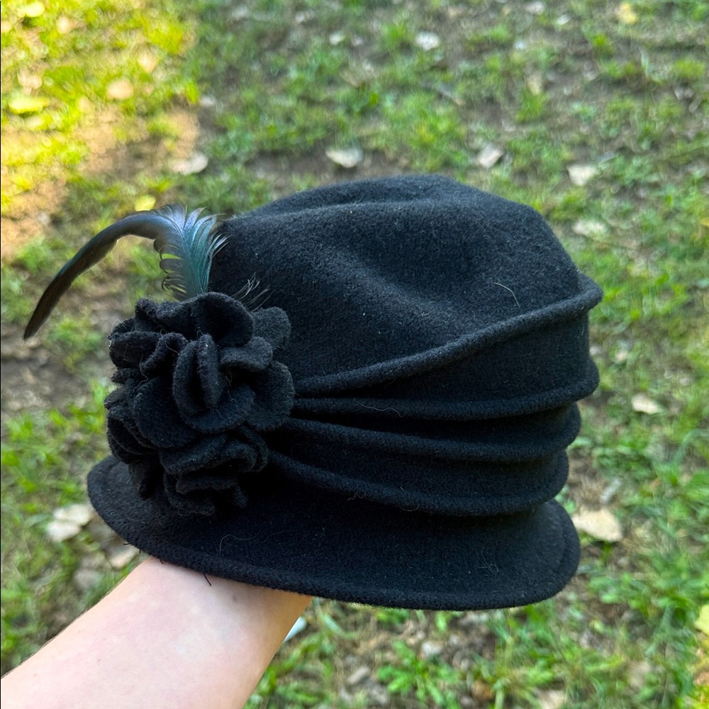 Scala Black Cloche Hat with Feather and Floral Detail handmade wool